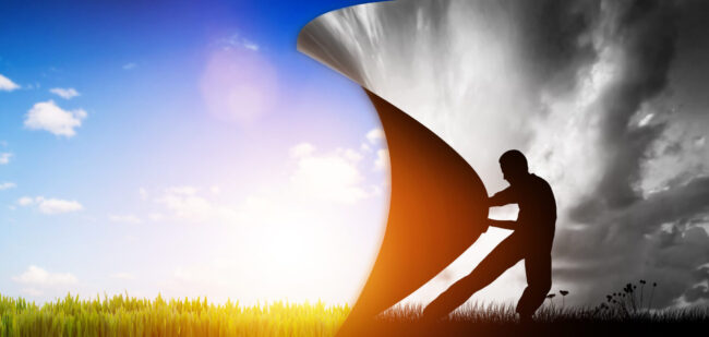 Man pulling the curtain up to a new colorful world.